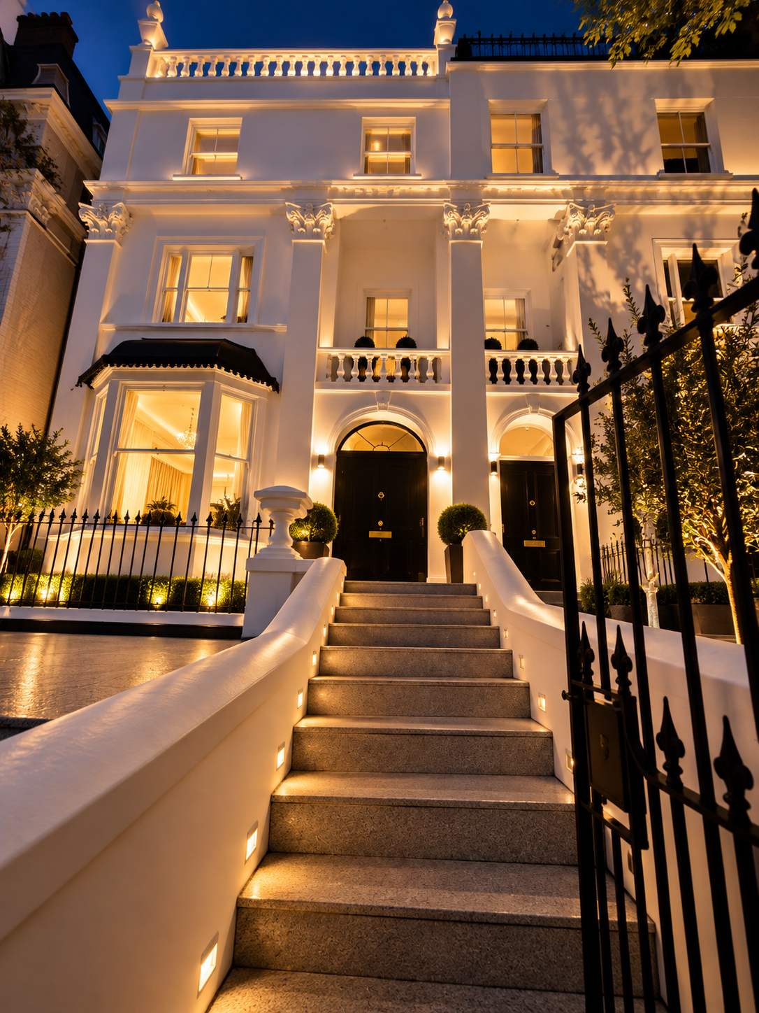 Floodlit London townhouse facade renovated by I & S at night